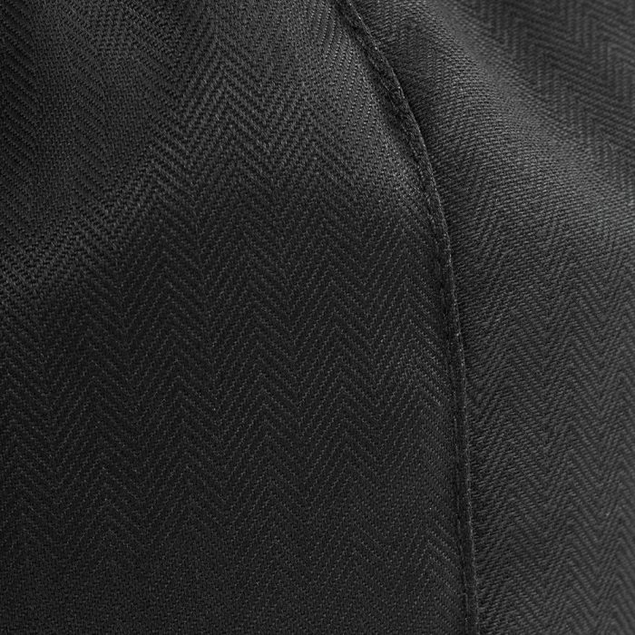 Close up of the black herringbone textured material