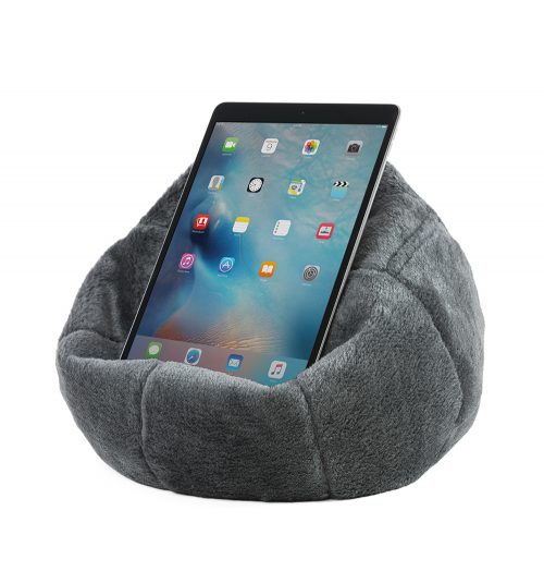 An iPad or tablet rests securely on the charcoal grey faux fur iCrib so you can use it hands free