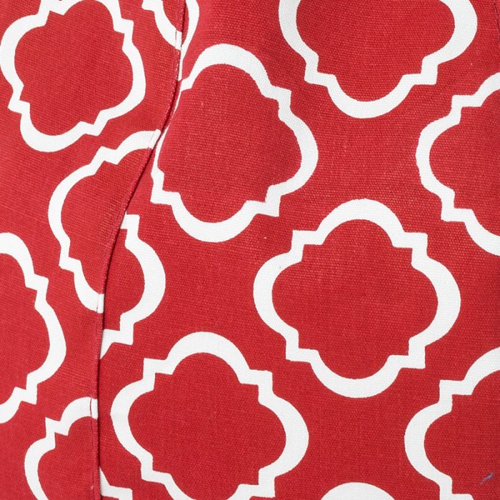 Close up of the red fabric with geometric white print used in the flame scarlet iCrib iPad tablet holder cushion bean bag