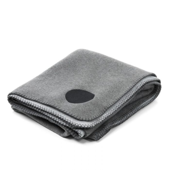 Folded grey designer fleece blanket for indoor and outdoor use