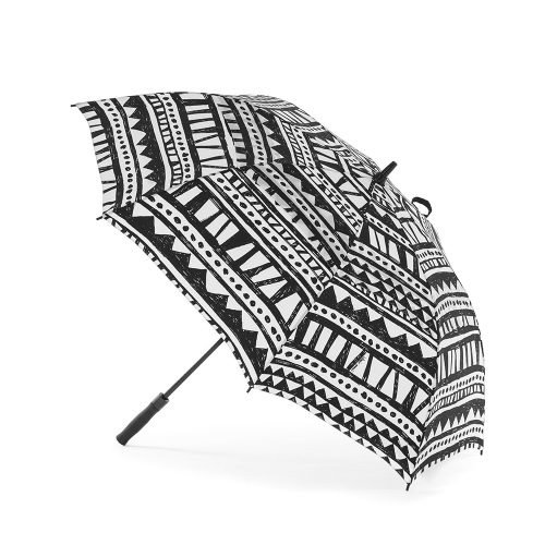 The bermuda rain umbrella shown open from the side. The print is handrawn black and white geometric repeating pattern.