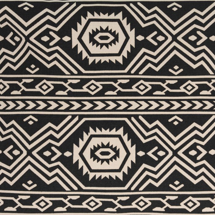 Close up of the black fabric with white aztec, tribal, geometric print