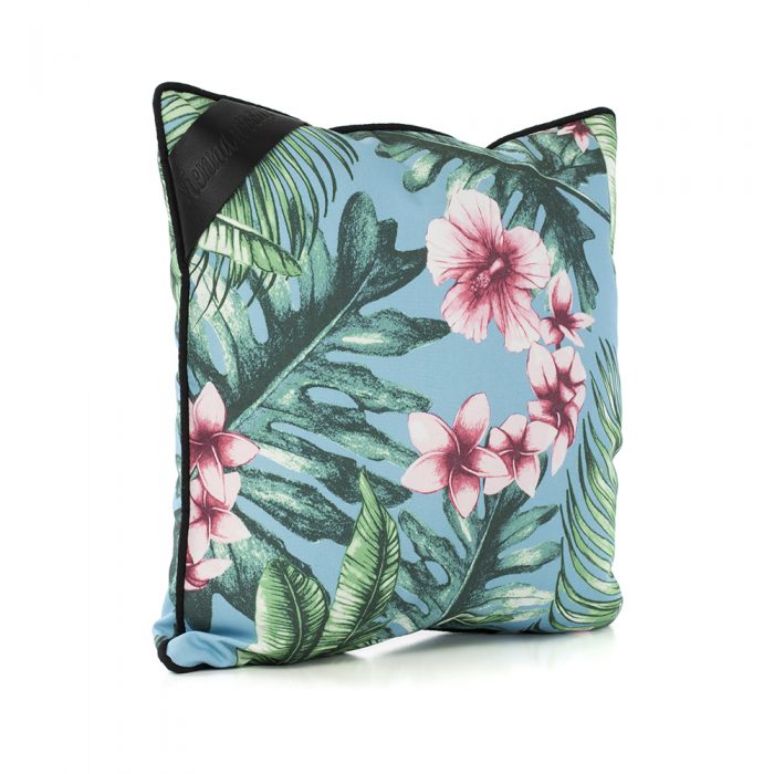 Oblique angle of the belvedere indoor outdoor cushion showing the hand drawn designer tropical print and black trim.