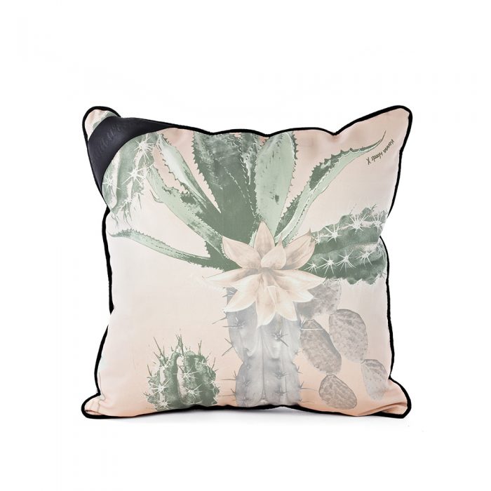 Kakteen hand drawn designer print indoor outdoor cushion on a white background. The kakteen print features large scale soft green cactus with pink flowers on a pale pink background.