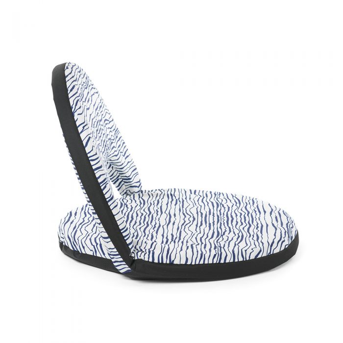 Side view of the blue and white wave marine print portable cushion recliner low beach chair seat