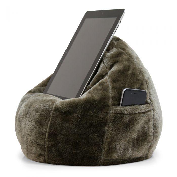 Donkey brown tan faux fur iCrib tablet holder mobile device bean bag stand. A phone sits in the storage pocket.