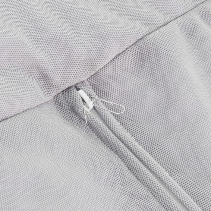 Close up of a paper clip in the safety zipper on the bean bag liner
