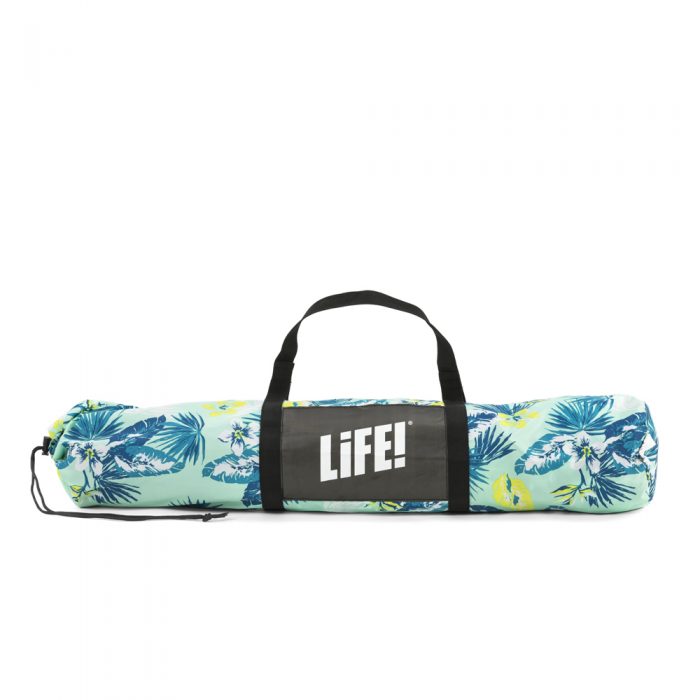 The tropical leaf print auto ezee sun shelter in its convenient carry bag