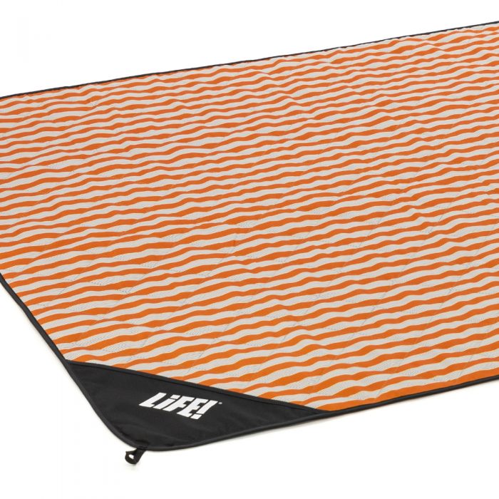 Oblique view of the retro stripe adventure mat picnic blanket.