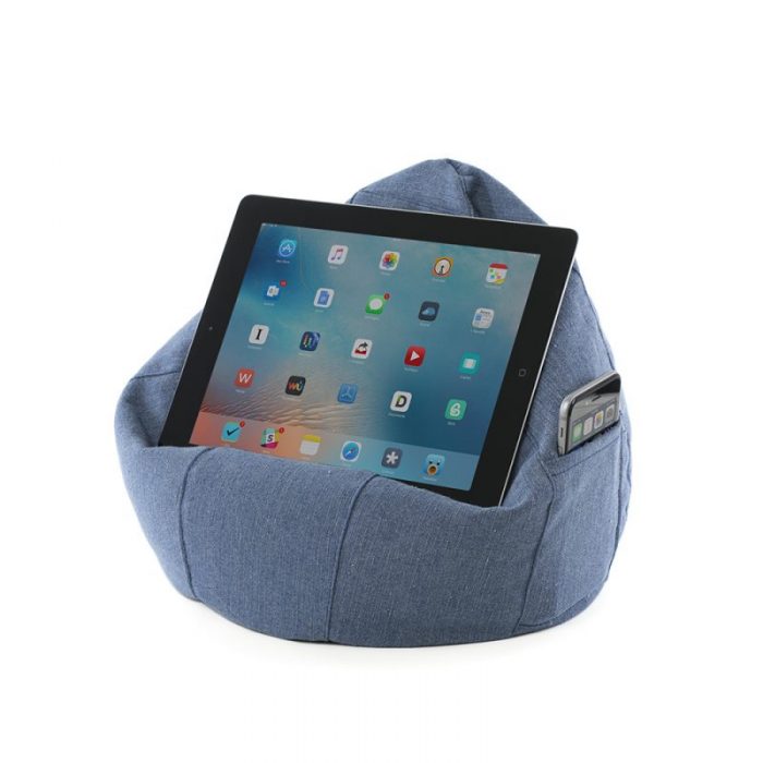 A tablet sits landscape on a denim blue iCrib. A phone sits in the storage pocket
