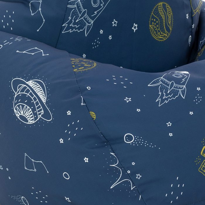 Close up of space buddy space print beanbag showing white planets and rockets on a blue background