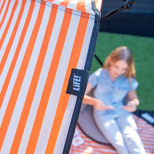 Close up of the LiFE! branded tag and alternating stripes on the retro airlie sun shelter