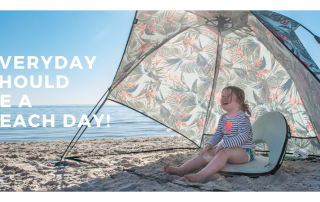 Banner shows a toddler laughing in a floral print easy pop up beach shelter. Text reads everyday should be a beach day