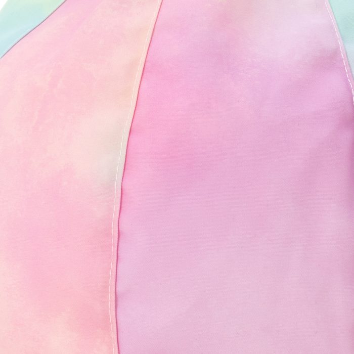 close up of the pastel print tie dye icrib material